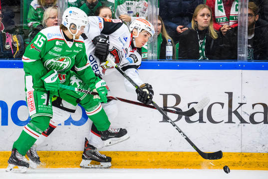 Rögles Simon Ryfors och Malmö Redhawks Henrik Hetta