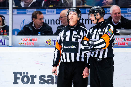 Domare Daniel Winge och  Mikael Andersson
