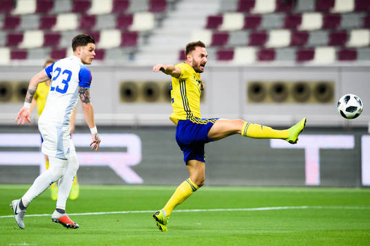 Eidur Sigbjörnsson. of Iceland  and Muamer Tankovic of