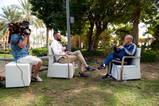 Journalist Olof Lundh interviews Sweden's head coach Janne