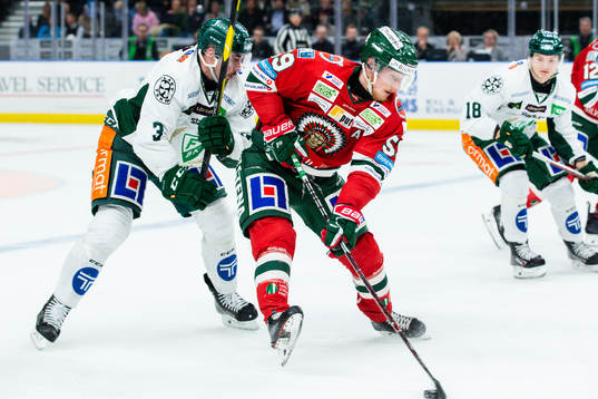 Färjestads Jens Westin och Frölunda Simon Hjalmarsson