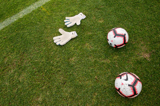 Nike footballs and goalkeeper gloves