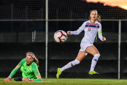 Goalkeeper Stephanie Labbe of Canada and Caroline Graham
