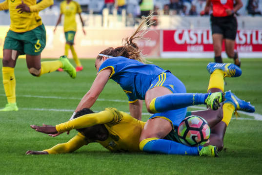 Noko Matlou of South Africa and Kosovare Asllani  of Sweden