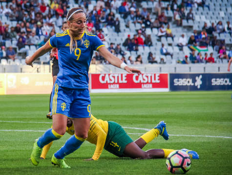 Noko Matlou of South Africa and Kosovare Asllani  of Sweden