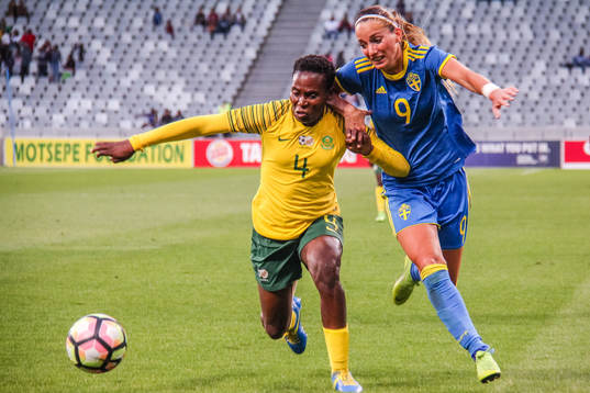 Noko Matlou of South Africa and Kosovare Asllani of Sweden