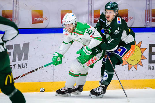 Rögles Simon Ryfors och Färjestads Joakim Nygård