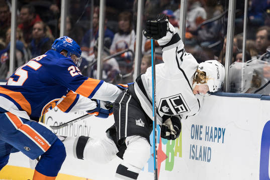 Devon Toews of New York Islanders and Carl Hagelin of Los