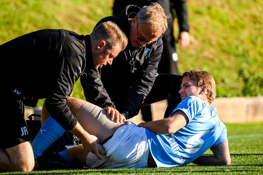 Oscar Lewicki of Malmö FF receives treatment