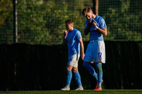 Lasse Nielsen and Rasmus Bengtsson looks dejected
