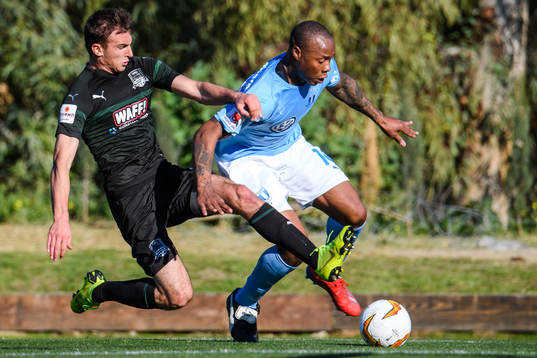 Carlos Strandberg of Malmö FF and Aleksandr Butenko of