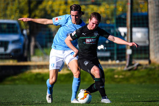 Adi Nalic  of Malmö FF and Igor Paradin of Krasnodar