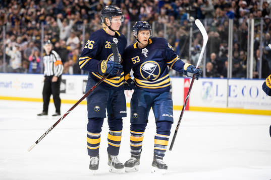Rasmus Dahlin and Jeff Skinner