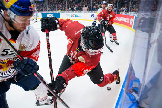 Patrick Hager of Red Bull Munich and Joel Lundqvist of