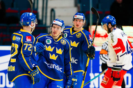 Emil Bemström of Sweden celebrates with teammates Joakim