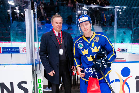 Dennis Rasmussen of Sweden gets a prize for best player of