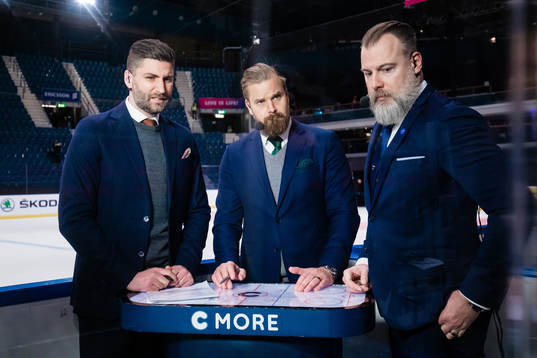 Björn Olden and Sanny Lindström of Cmore with head coach