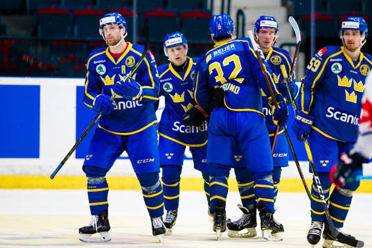 Jonathan Davidsson of Sweden celebrates 5-2 with teammates