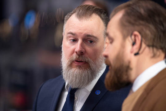 head coach Rikard Grönborg of Sweden talking to a reporter