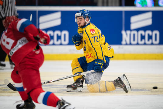 Emil Bemström of Sweden blocking a shot from Rushan