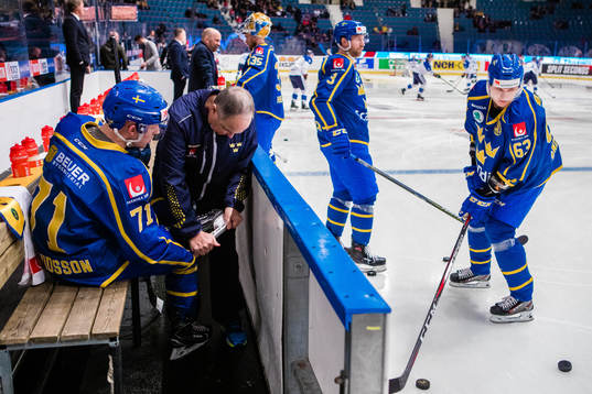 Jonathan Davidsson of Sweden and Equipment manager Anders