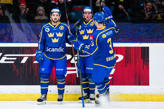 Emil Bemström of Sweden celebrates with teammates