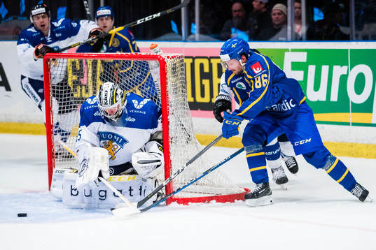Mathias Bromé of Sweden with a chance to score in front of
