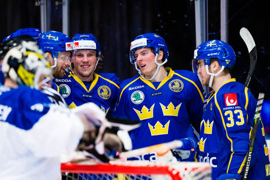 Isac Lundeström of Sweden celebrates with teammates