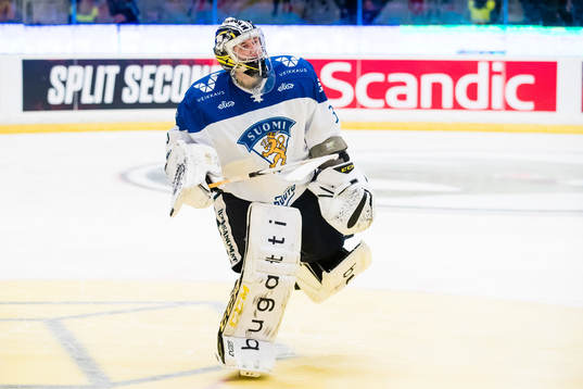 Goaltender Veini Vehviläinen celebrates