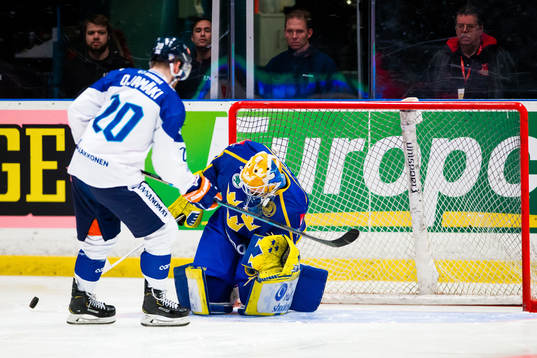 Goaltender Magnus Hellberg of Sweden saves a penalty shot