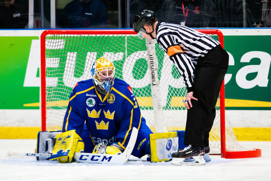Goaltender Magnus Hellberg of Sweden a head of a penalty