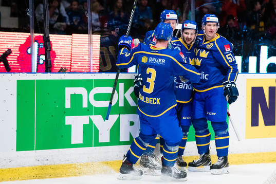 Emil Bemström of Sweden celebrates with teammates