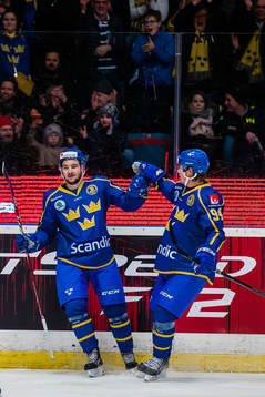 Emil Bemström celebrates with teammate Joel Persson
