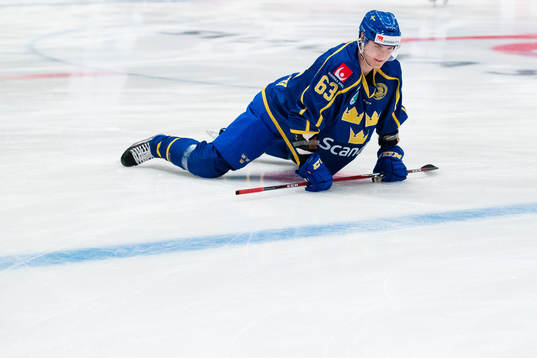 Fredrik Händemark of Sweden a head of the Beijer Hockey