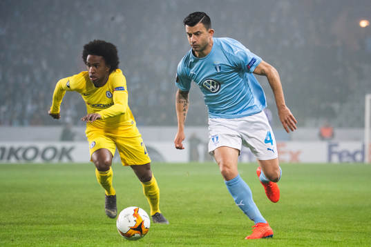 Willian of Chelsea and Behrang Safari of Malmö FF