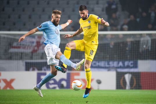 Rasmus Bengtsson of Malmö FF and Olivier Giroud of Chelsea