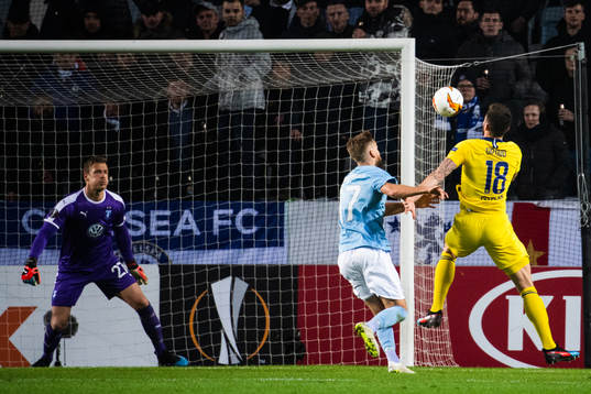 goalkeeper Johan Dahlin and Rasmus Bengtsson of Malmö FF