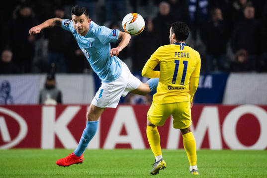 Behrang Safari of Malmö FF clear the ball in front of