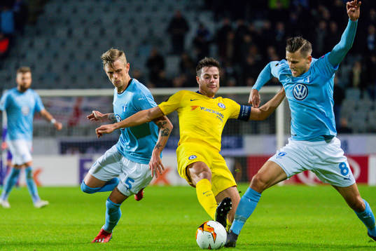 Sören Rieks and Arnor Traustason of Malmö FF and César