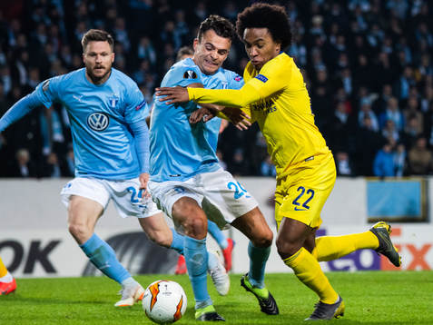 Andreas Vindheim and Lasse Nielsen of Malmö FF compete for