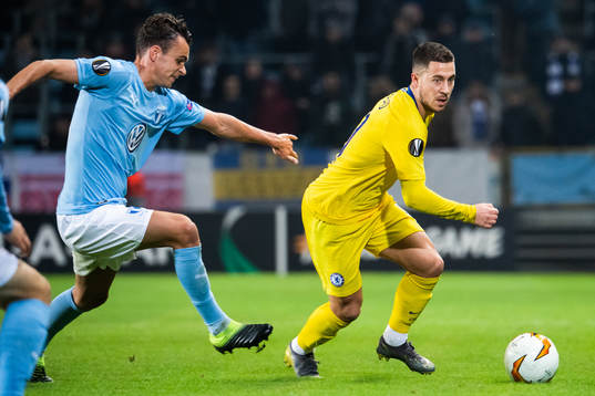 Andreas Vindheim of Malmö FF chases Eden Hazard of Chelsea