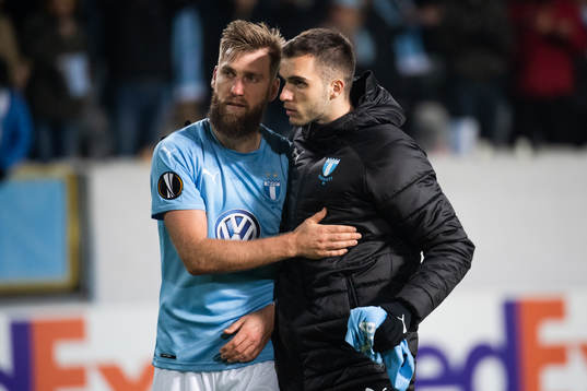Rasmus Bengtsson and Egzon Binaku of Malmö FF look dejected