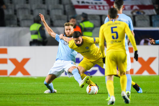 Rasmus Bengtsson of Malmö FF and Olivier Giroud of Chelsea