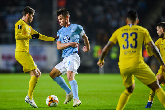 Markus Rosenberg of Malmö FF and Jorginho of Chelsea
