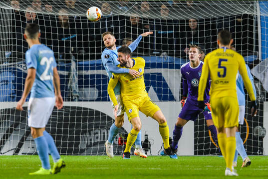 Lasse Nielsen of Malmö FF and Olivier Giroud of Chelsea