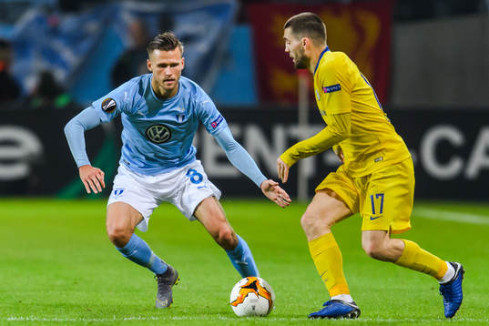 Arnór Ingvi Traustason of Malmö FF and Mateo Kovacic of