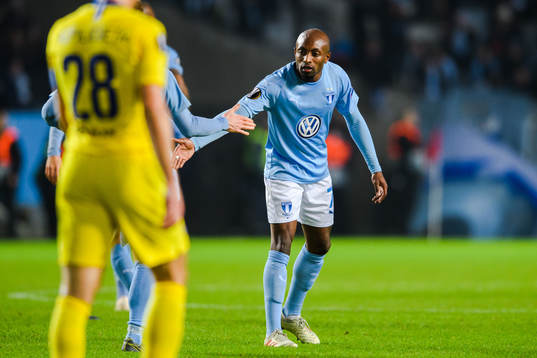 Fouad Bachirou celebrates with Anders Christiansen of