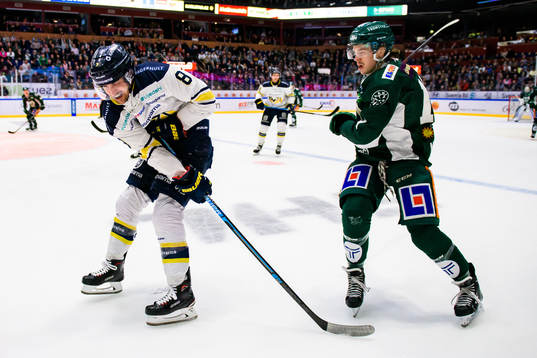 s Nils Andersson och Färjestads Joakim Nygård
