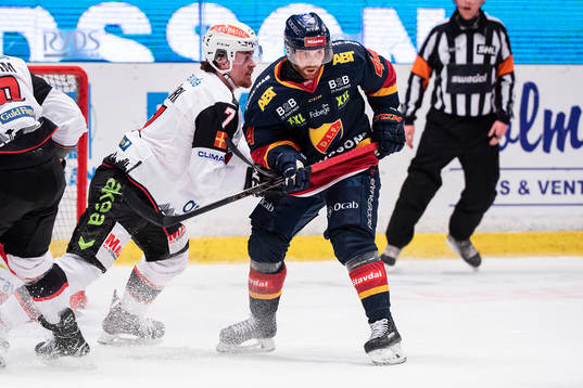 Malmö Redhawks Marcus Björk och Djurgårdens Mattias Guter