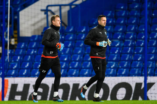 Goalkeeper Johan Dahlin and goalkeeper Dusan Melicharek of